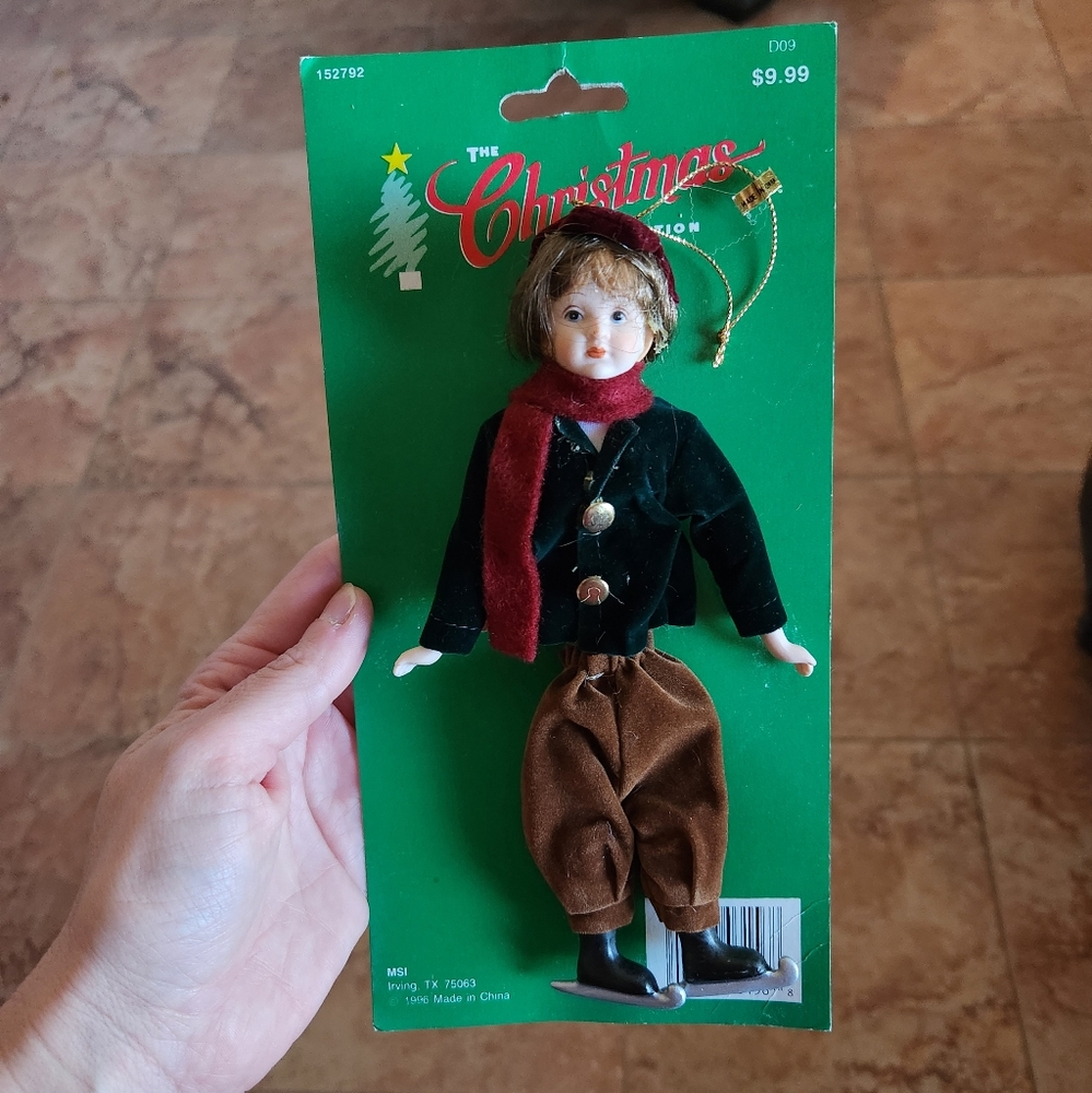 NWT The Christmas collection porcelain boy with skates